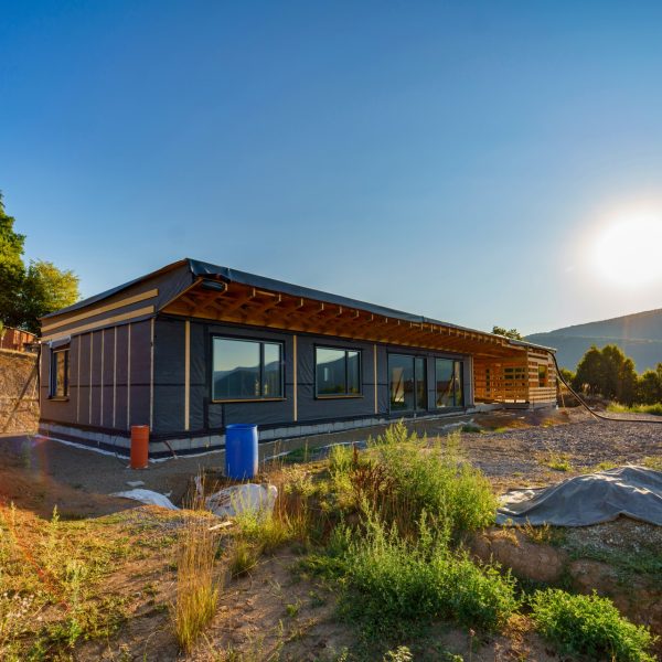 Unfinished construction of ecological sustainable wooden eco house in the middle of nature.
